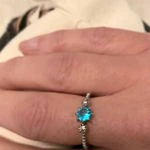 Beautiful blue and clear crystal ring in a Silver overlay settimg